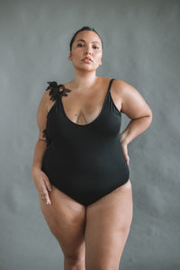 black one-piece swimsuit with chiffon leaves